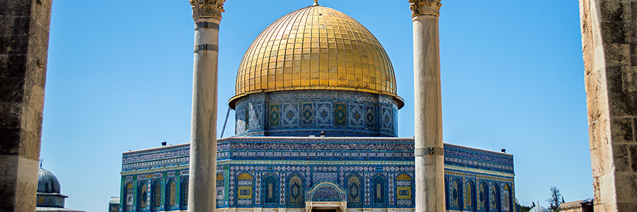 Gold domed building with blue mosaic tiles